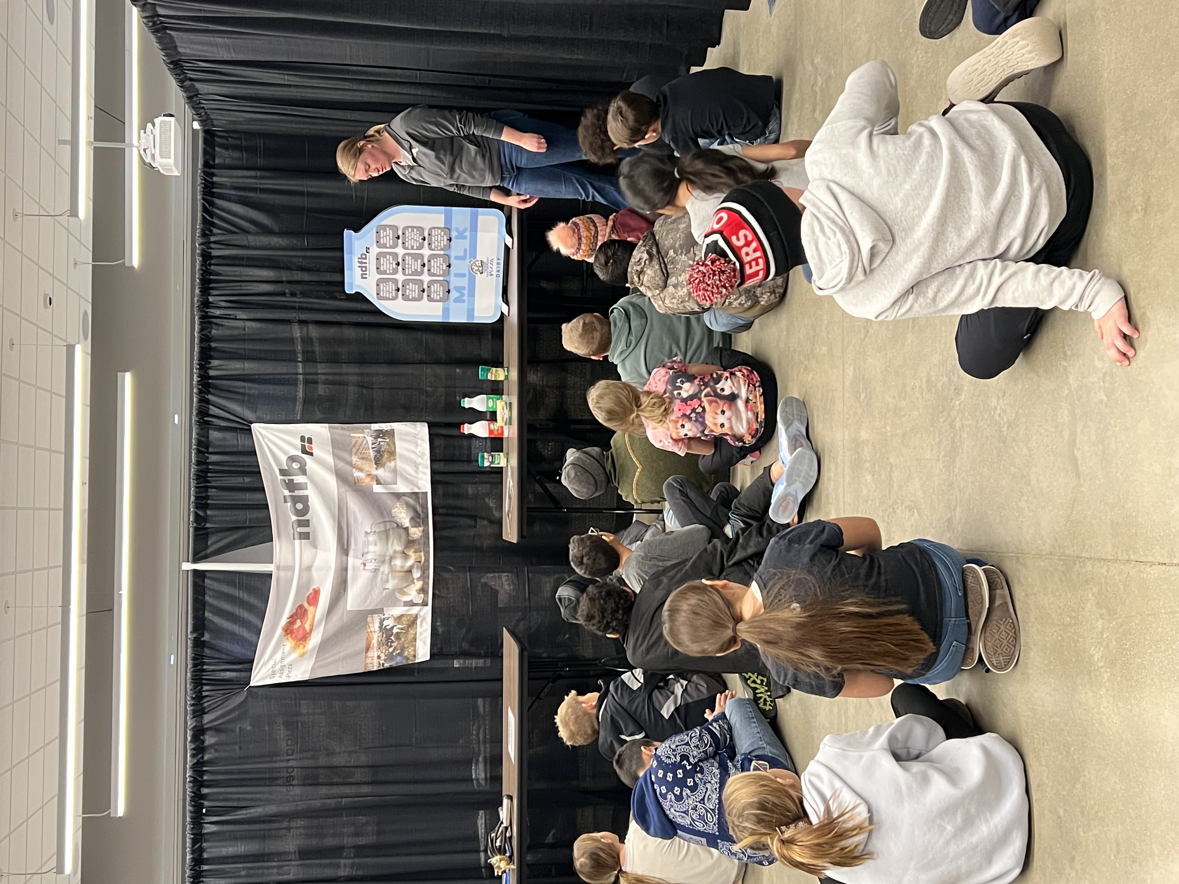 NDFB staff member Molly Kerner talks about milk at the SAP event in Williston