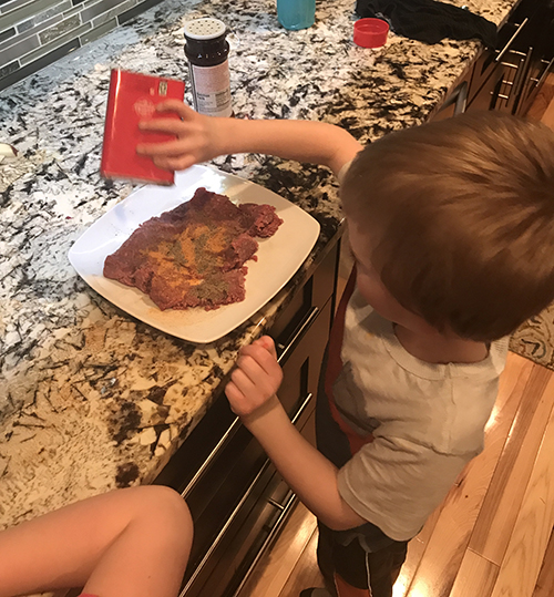Kids helping to make burgers