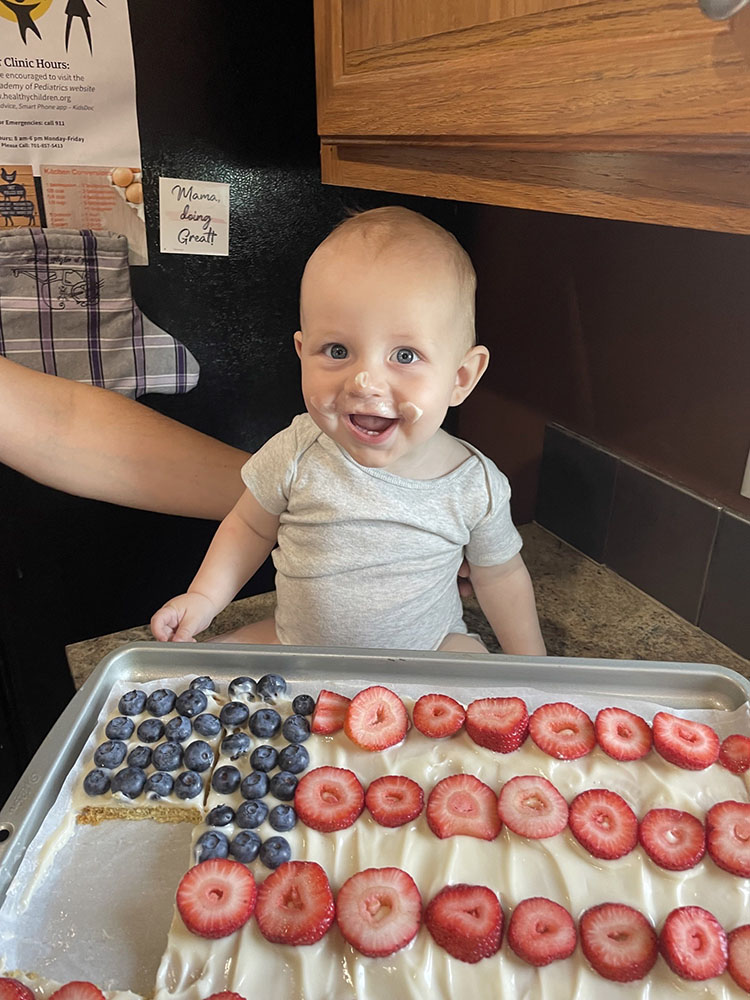 Fruit pizza and sweet little boy