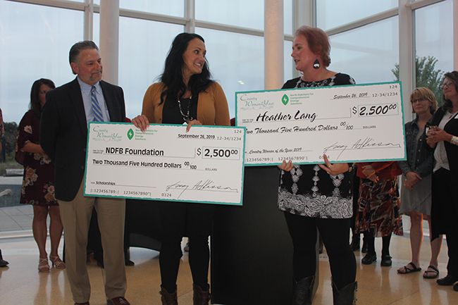 Country Woman of the Year check given to NDFB Foundation for youth scholarships