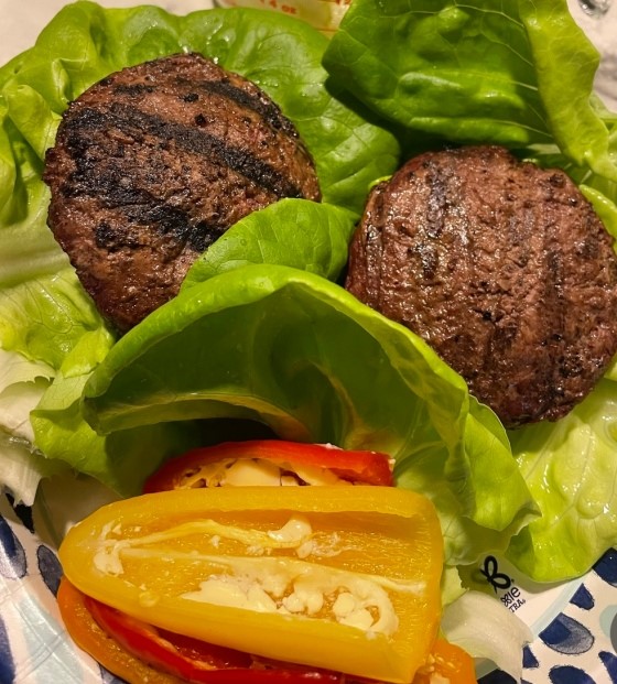 Peppers, grilled burger and lettuce